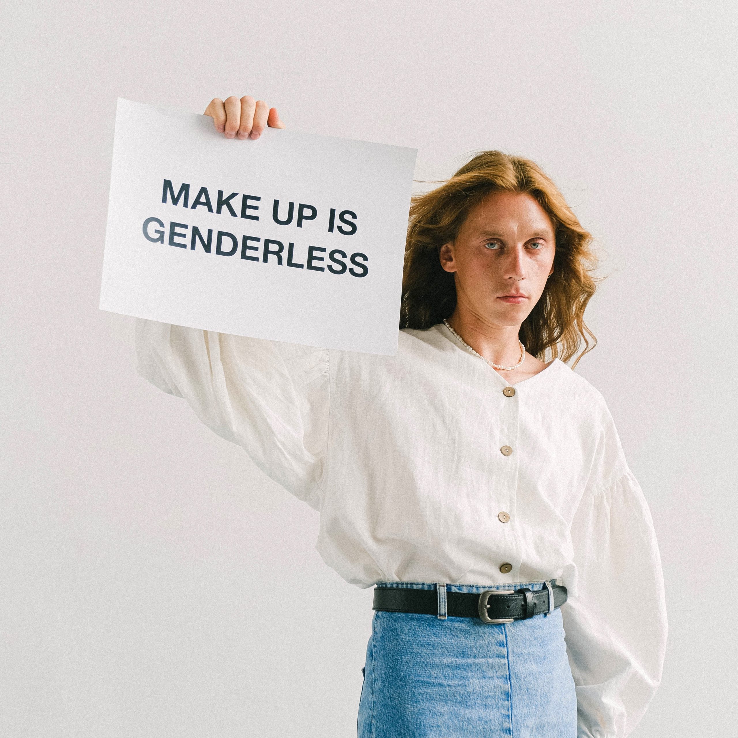 man wearing feminine clothing challenging gender norms and stereotypes