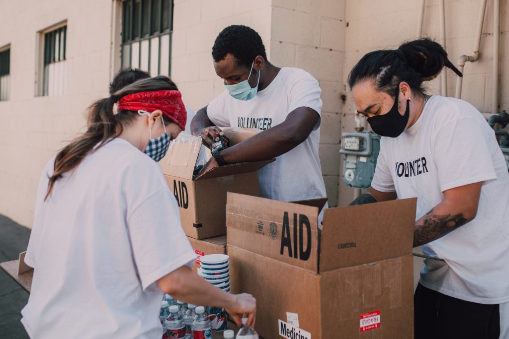 Volunteers supplying food and medicines