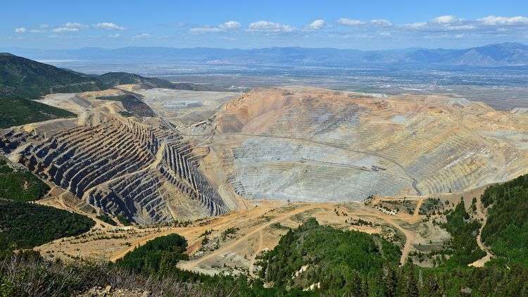 The Bingham Canyon Mine. Humans have repeatedly robbed the world’s deepest open pit of its materials and minerals, namely rocks, soil & water.
