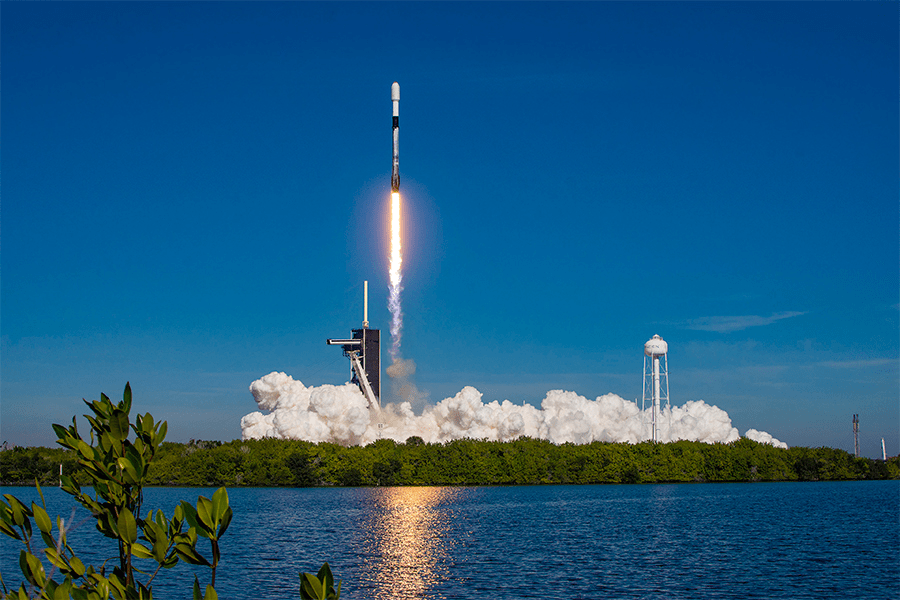 A SpaceX Falcon 9 Rocket lifts off from the Kennedy Space Centre carrying Starlink satellites.