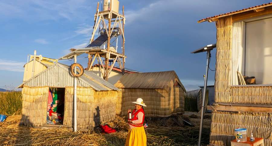 Photo by Miguel Angel Mamani Mamani: https://www.pexels.com/photo/peruvian-farmhouse-and-a-standing-woman-13850710/